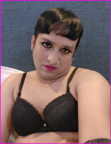 Feminised sissy Candi wearing no wig but make-up and a bra Feminised sissy Candi wearing no wig but make-up and a bra