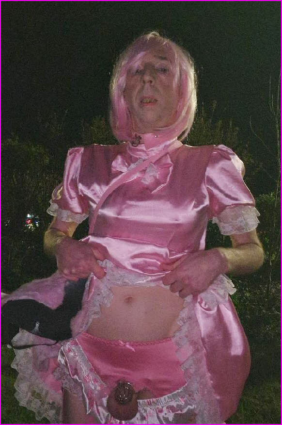 Poofy pink sissy maid Cassandra wearing frilly satin uniform and cock cage Poofy pink sissy maid Cassandra wearing frilly satin uniform and cock cage