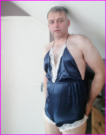 Hairy-chested Oliver cross-dressing in slutty lingerie