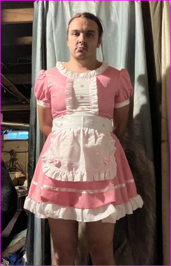 Humiliated adult male from Canada wearing pink French maid uniform