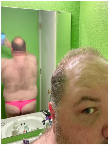 Loser male Mark shows off his hairy arse in a pink thong