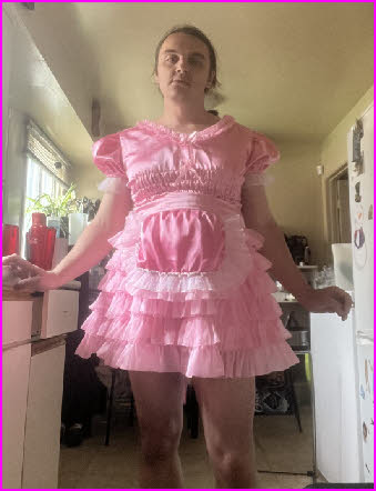 Sissy Pampers emasculated in frilly pink fairy frock