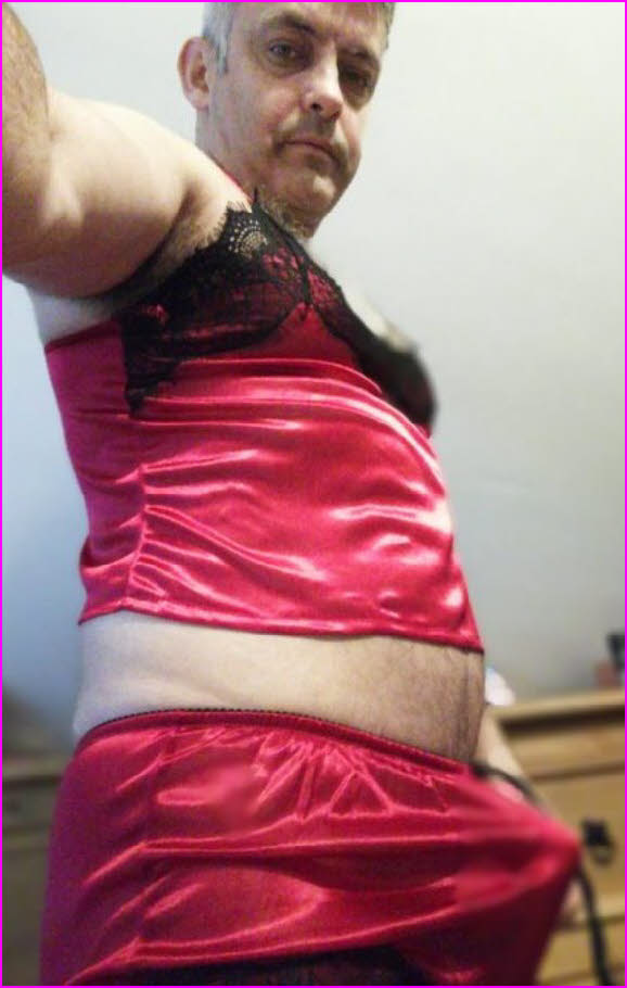 Married cross-dresser Oliver gets a boner in his red satin knickers