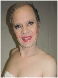 Gay sissy Jochen wearing lipstick and false eyelashes