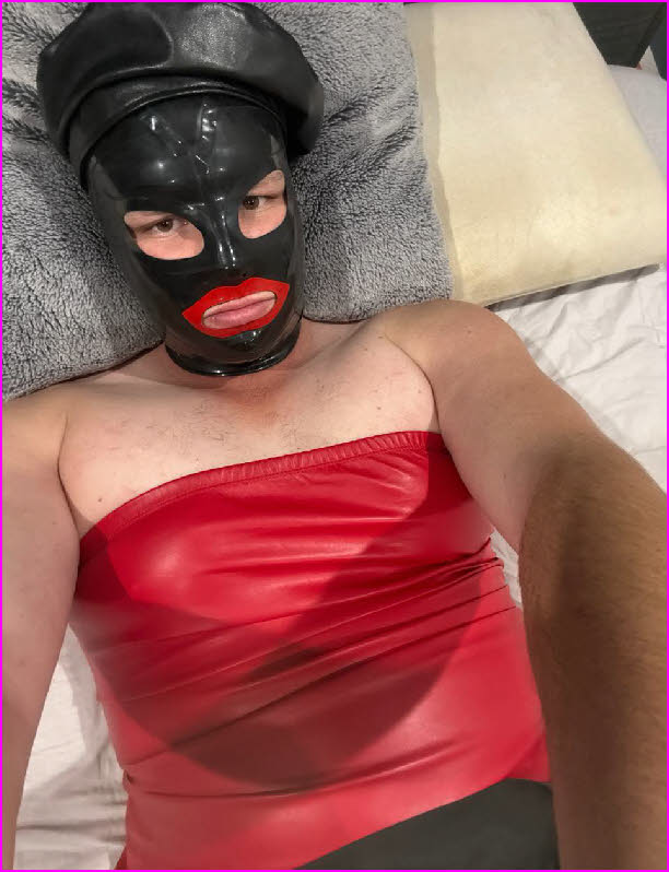 Crossdressing sissy loser Jasmine wearing a black latex blowjob mask Crossdressing sissy loser Jasmine wearing a black latex blowjob mask