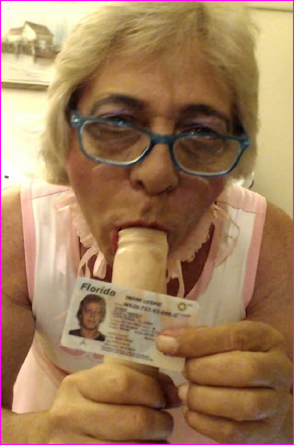 Sissy Scott Whims from Florida proudly displays his male driiving license Sissy Scott Whims from Florida proudly displays his male driiving license