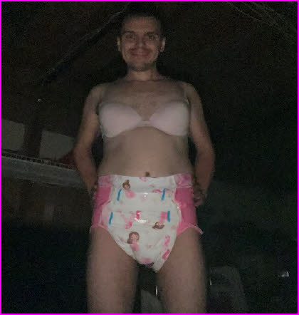 Pathetic sissy loser dolls up in girlie bra and nappy