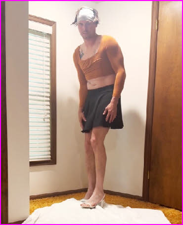 Feminised sissy husband looking like a loser in his girlie top and skirt