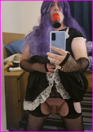 Transvestite maid Amy swallows large vibrator Transvestite maid Amy swallows large vibrator