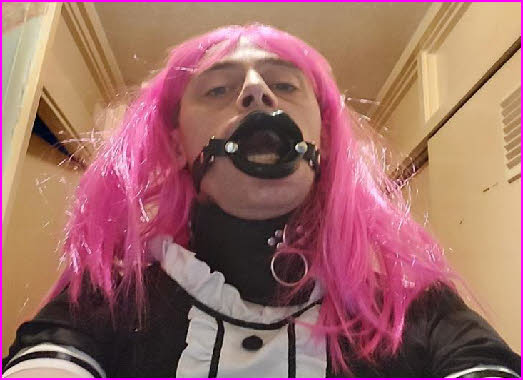 Pink-wigged sissy maid gagged with O-ring Pink-wigged sissy maid gagged with O-ring