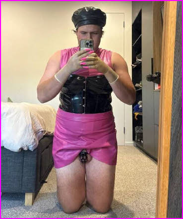 Australian loser Sissy Jasmine wearing a pink leather frock and chastity Australian loser Sissy Jasmine wearing a pink leather frock and chastity