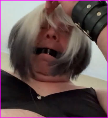 Failed male transforms into gagged sissy bitch