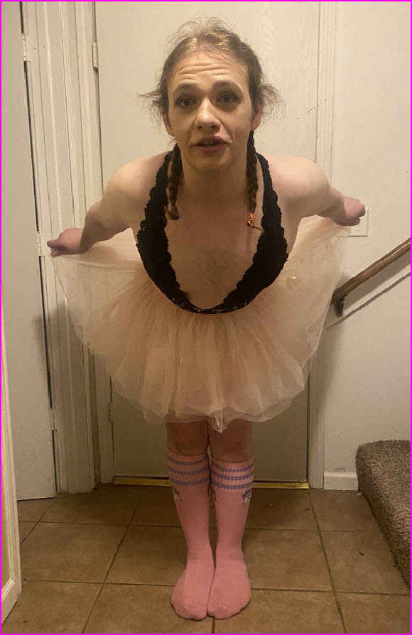 Being photographed in this frilly pink tutu could totally ruin Sissy Gus as a man Being photographed in this frilly pink tutu could totally ruin Sissy Gus as a man