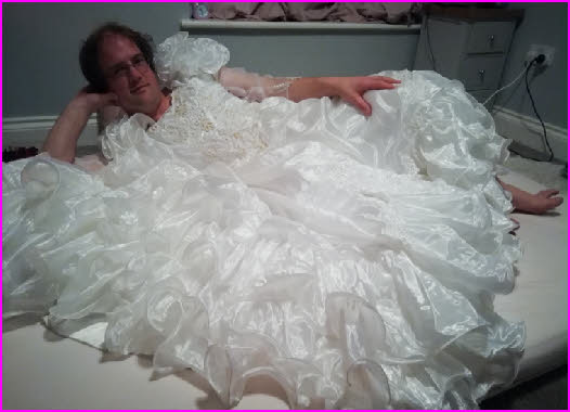 Irpsh cross-dresser Georgina exposed in flowing white bridal gown